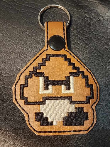 Retro 8-bit henchman icon keychain