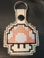 Retro 8-bit 1-up mushroom icon keychain